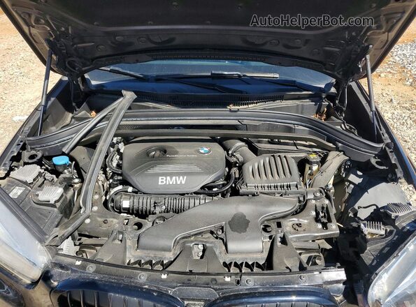 WBXHT3C39H5F67894 2017 BMW X1 Black Engine compartment view