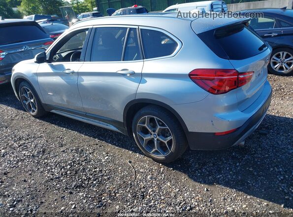 WBXHT3C39H5F69483 2017 BMW X1 Серебряный Задняя левая четверть