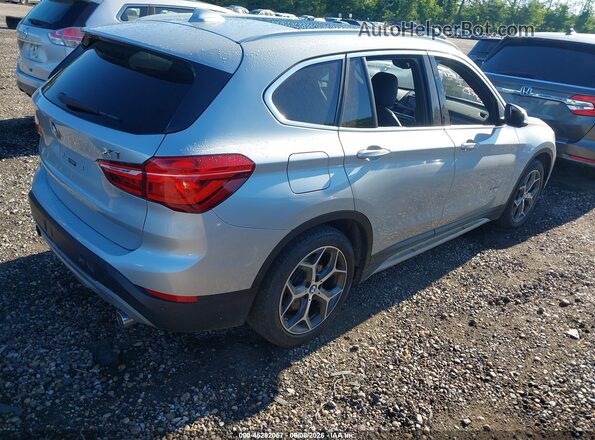 WBXHT3C39H5F69483 2017 BMW X1 Серебряный Задняя правая четверть