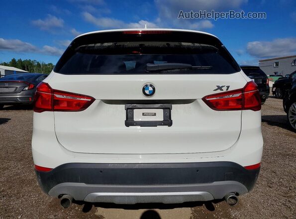 WBXHT3C39J5F88623 2018 BMW X1 White Rear view