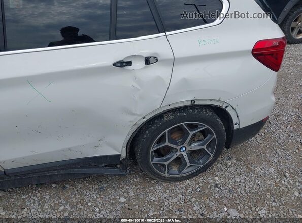 WBXHT3C39J5F92722 2018 BMW X1 White Դիմացի տեսք