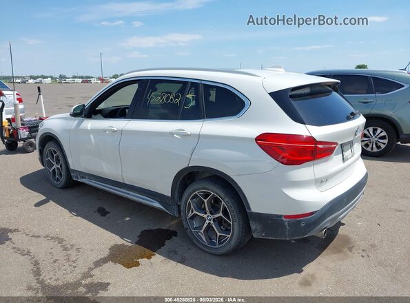 WBXHT3C39J5L31278 2018 BMW X1 White Rear left