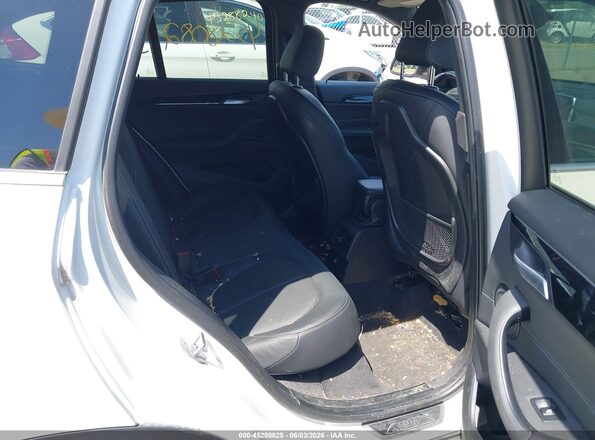 WBXHT3C39J5L31278 2018 BMW X1 White VIN sticker view