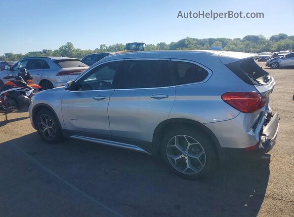 WBXHT3C3XGP882672 2016 BMW X1 Серебряный Задняя левая четверть