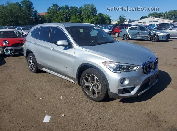 WBXHT3C3XGP882672 2016 BMW X1 Серебряный Передняя правая четверть