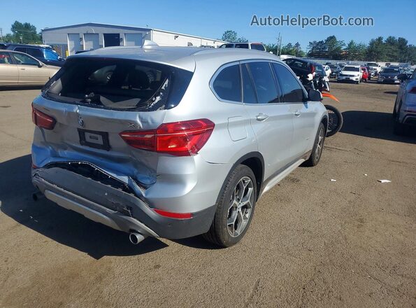 WBXHT3C3XGP882672 2016 BMW X1 Серебряный Задняя правая четверть