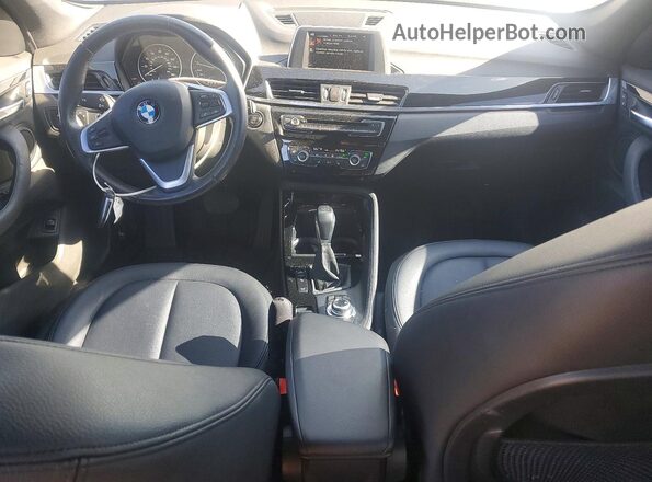 WBXHT3C3XGP882672 2016 BMW X1 Серебряный Вид панели приборов