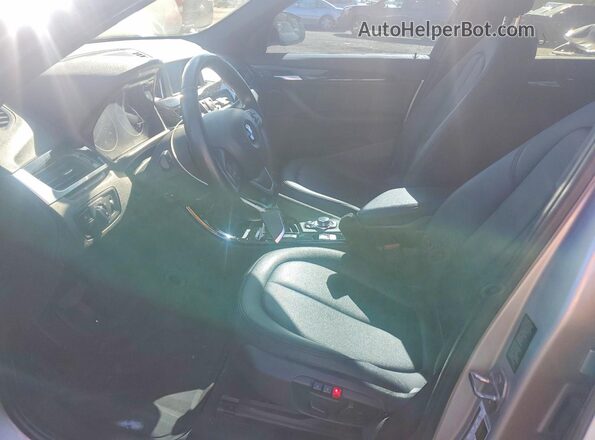 WBXHT3C3XGP882672 2016 BMW X1 Серебряный Вид салона спереди