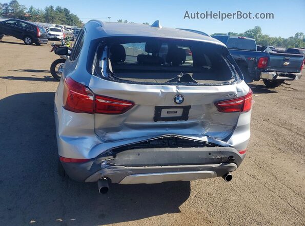 WBXHT3C3XGP882672 2016 BMW X1 Серебряный Вид сзади