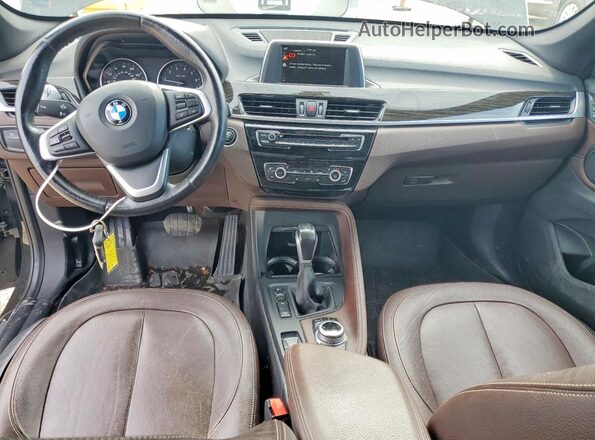 WBXHT3C3XH5F75129 2017 BMW X1 Black Dashboard view
