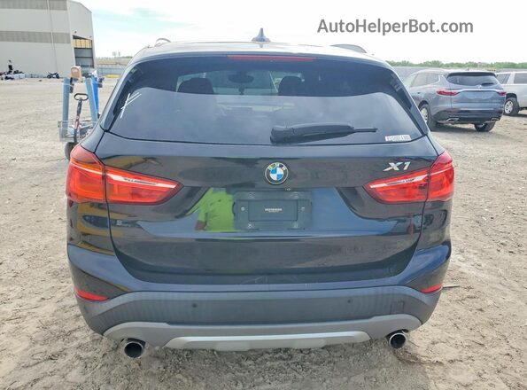 WBXHT3C3XH5F75129 2017 BMW X1 Black Rear view