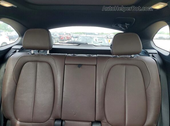 WBXHT3C3XH5F75129 2017 BMW X1 Black Rear seats view