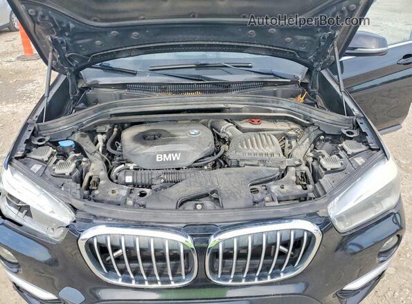 WBXHT3C3XH5F75129 2017 BMW X1 Black Engine compartment view