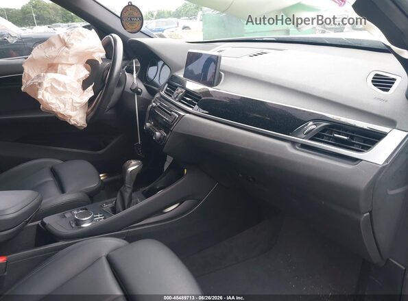 WBXHT3C52K5L91339 2019 BMW X1 Silver Widok wnętrza z przodu