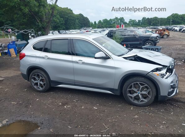 WBXHT3C52K5L91339 2019 BMW X1 Silver Widok wnętrza z tyłu