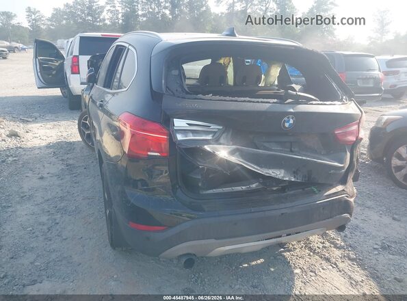WBXHT3C57K3H34547 2019 BMW X1 Gray Rear left