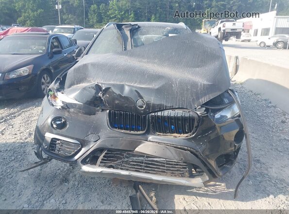 WBXHT3C57K3H34547 2019 BMW X1 Gray Instrument cluster view