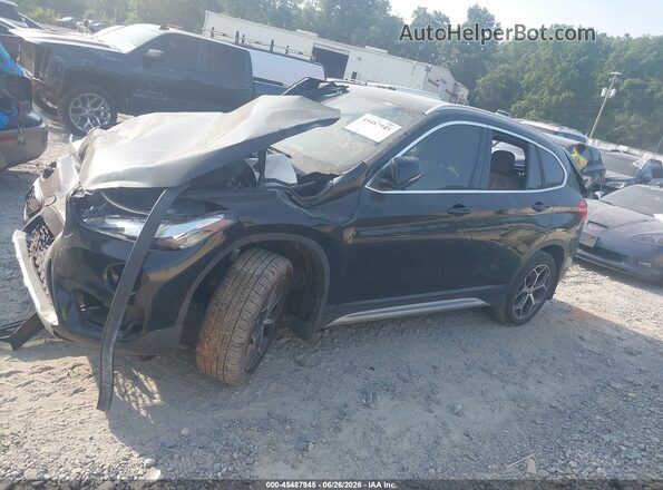 WBXHT3C57K3H34547 2019 BMW X1 Gray 360 interior view