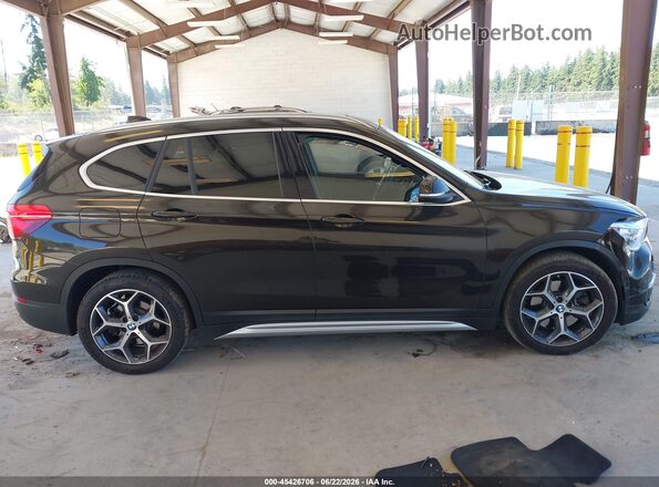 WBXHT3C58K5L36023 2019 BMW X1 Black Widok wnętrza z tyłu