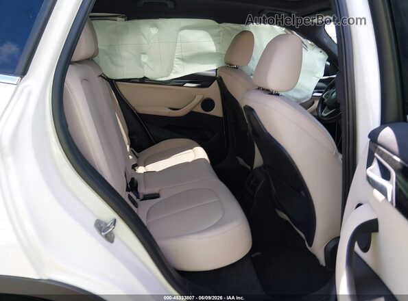 WBXHT3C59K5L37732 2019 BMW X1 White VIN კოდის სტიკერის ხედი