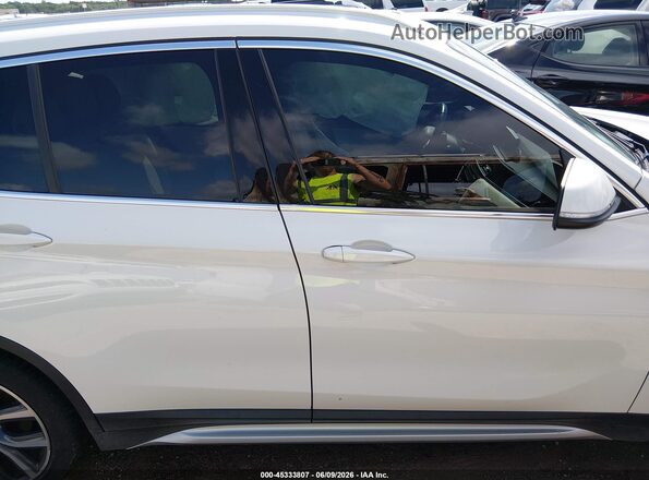 WBXHT3C59K5L37732 2019 BMW X1 White უკანა სალონის ხედი