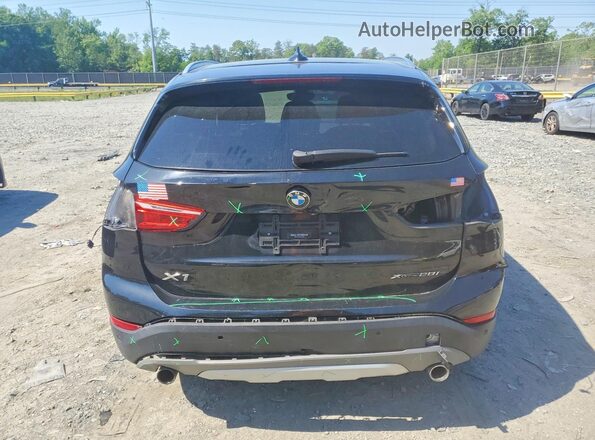 WBXHT3C59K5L38086 2019 BMW X1 Black Հետևի տեսք
