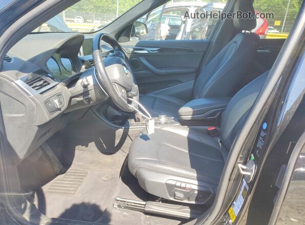 WBXHT3C59K5L38086 2019 BMW X1 Black Սալոնի դիմացի տեսք