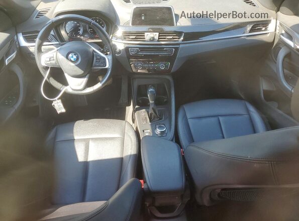 WBXHT3C59K5L38086 2019 BMW X1 Black Առջևի վահանակի տեսք