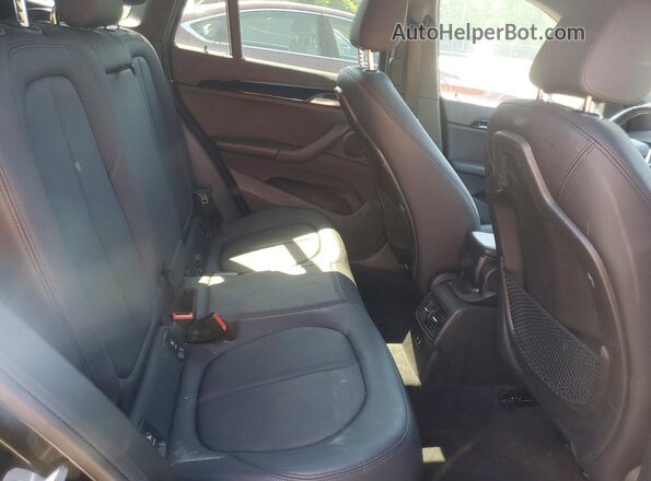 WBXHT3C59K5L38086 2019 BMW X1 Black Սալոնի հետևի տեսք