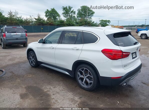 WBXHT3C59K5N47747 2019 BMW X1 White Rear left