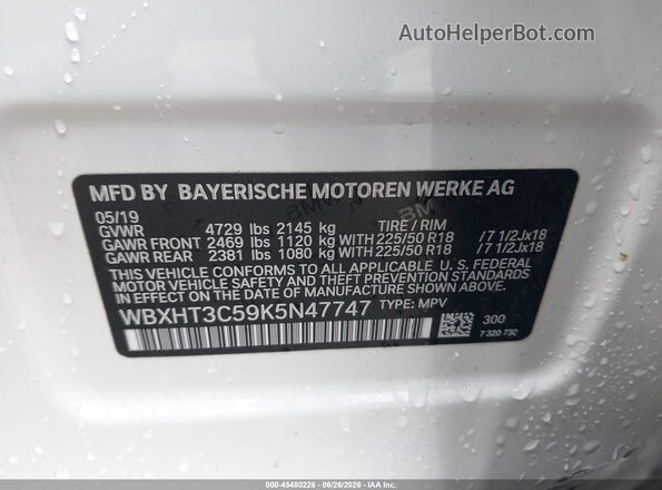 WBXHT3C59K5N47747 2019 BMW X1 White Engine compartment view