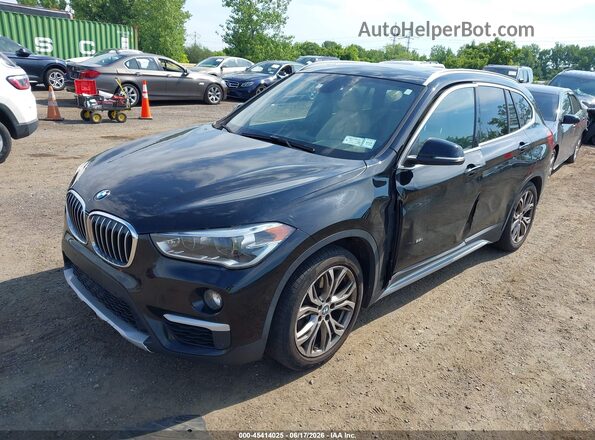 WBXHT3Z30G4A50916 2016 BMW X1 Black 