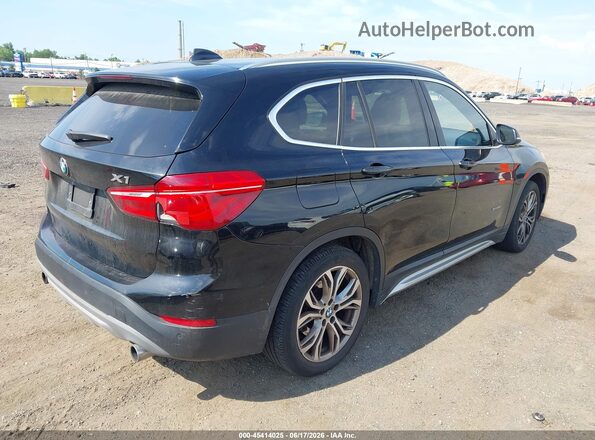 WBXHT3Z30G4A50916 2016 BMW X1 Black 