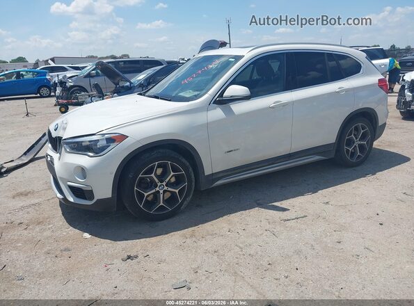 WBXHT3Z31G4A50178 2016 BMW X1 White Առջևի ձախ երեք քառորդ տեսարան