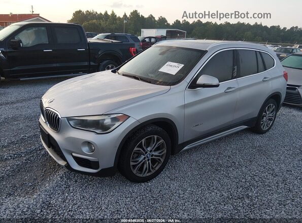 WBXHT3Z31H4A54328 2017 BMW X1 Silver წინა მარცხენა ხედი სამი მეოთხედიდან