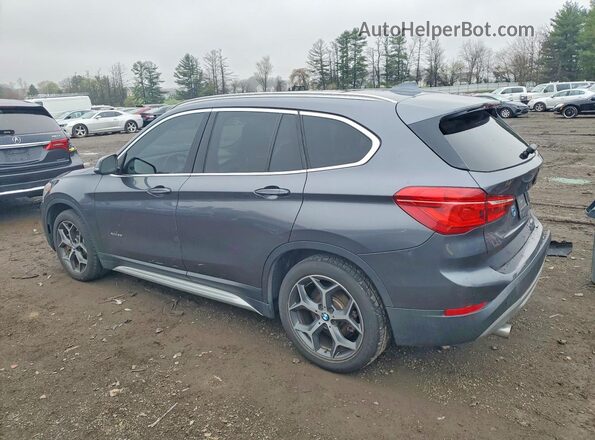 WBXHT3Z33H4A54010 2017 BMW X1 Gray Trasero izquierdo