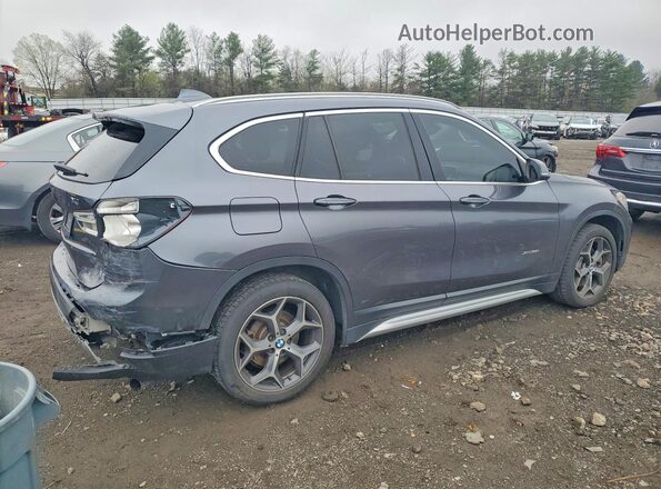 WBXHT3Z33H4A54010 2017 BMW X1 Gray Trasero derecho