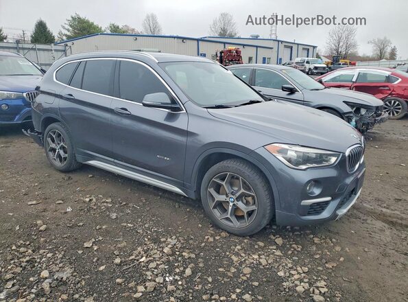 WBXHT3Z33H4A54010 2017 BMW X1 Gray Delantero derecho