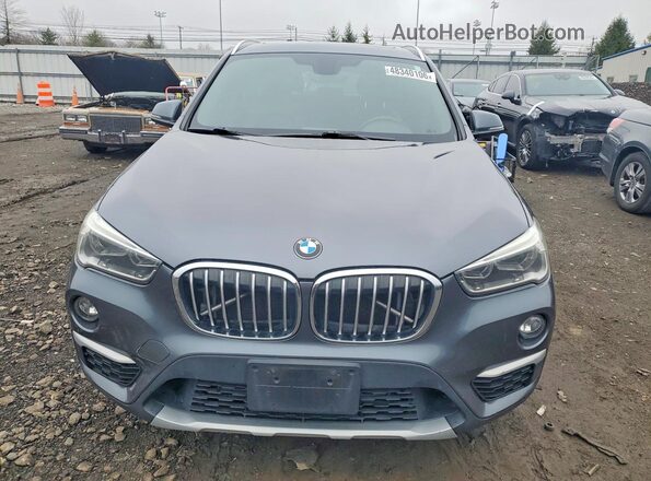 WBXHT3Z33H4A54010 2017 BMW X1 Gray Vista frontal