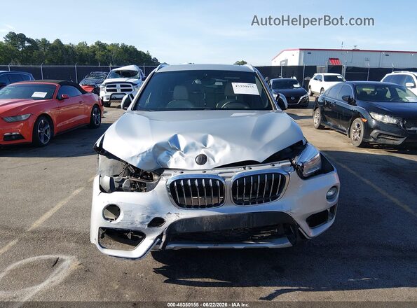 WBXHT3Z33H4A58204 2017 BMW X1 Silver უკანა სალონის ხედი