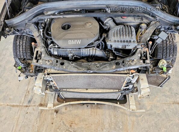 WBXHT3Z34G4A51521 2016 BMW X1 Charcoal Սալոնի հետևի տեսք