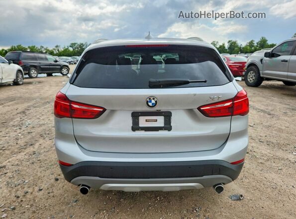 WBXHT3Z34H4A57871 2017 BMW X1 Серебряный Вид сзади