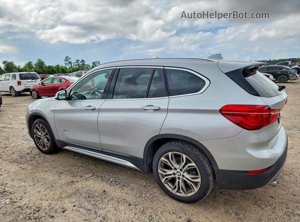 WBXHT3Z34H4A57871 2017 BMW X1 Серебряный Задняя левая четверть