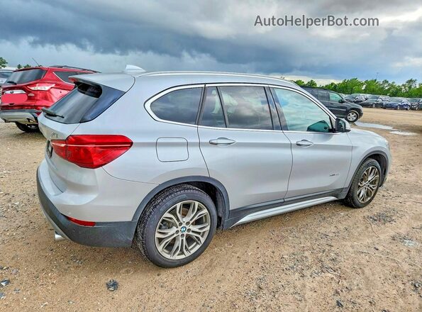 WBXHT3Z34H4A57871 2017 BMW X1 Серебряный Задняя правая четверть