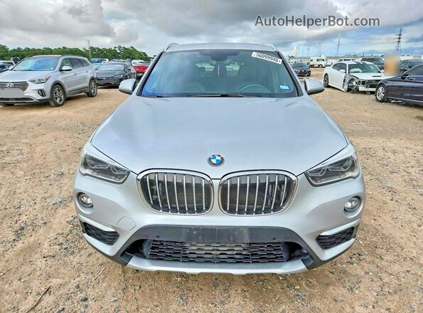 WBXHT3Z34H4A57871 2017 BMW X1 Серебряный Вид спереди