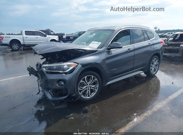 WBXHT3Z36G4A49608 2016 BMW X1 Gray Передня ліва чверть