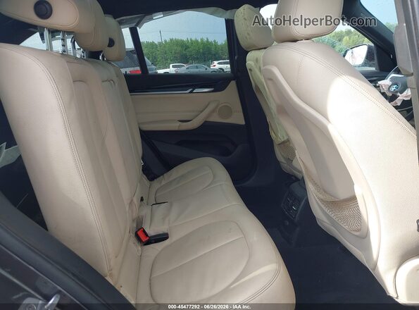 WBXHT3Z36G4A49608 2016 BMW X1 Gray Вид наклейки з VIN-кодом