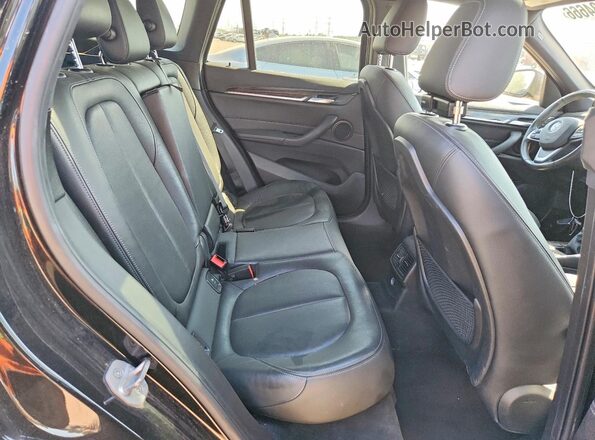 WBXHT3Z37G4A51304 2016 BMW X1 Black Հետևի նստատեղերի տեսք