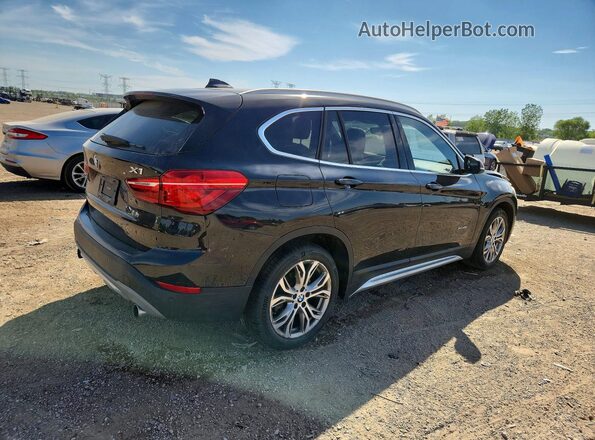 WBXHT3Z37G4A51304 2016 BMW X1 Black Հետևի աջ