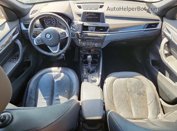 WBXHT3Z37G4A51304 2016 BMW X1 Black Առջևի վահանակի տեսք